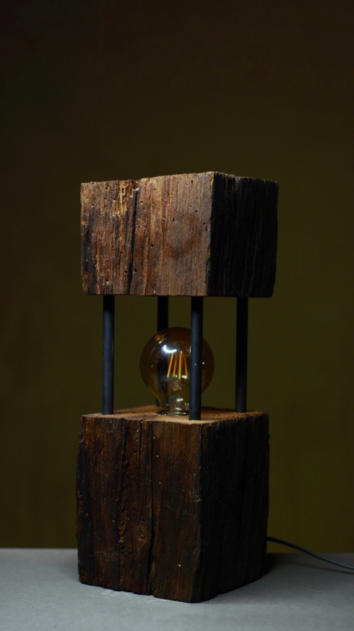 Wooden table lamp made with sustainable materials and energy-efficient LED lighting.